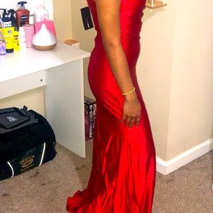 Red long  satin dress with a knee split.